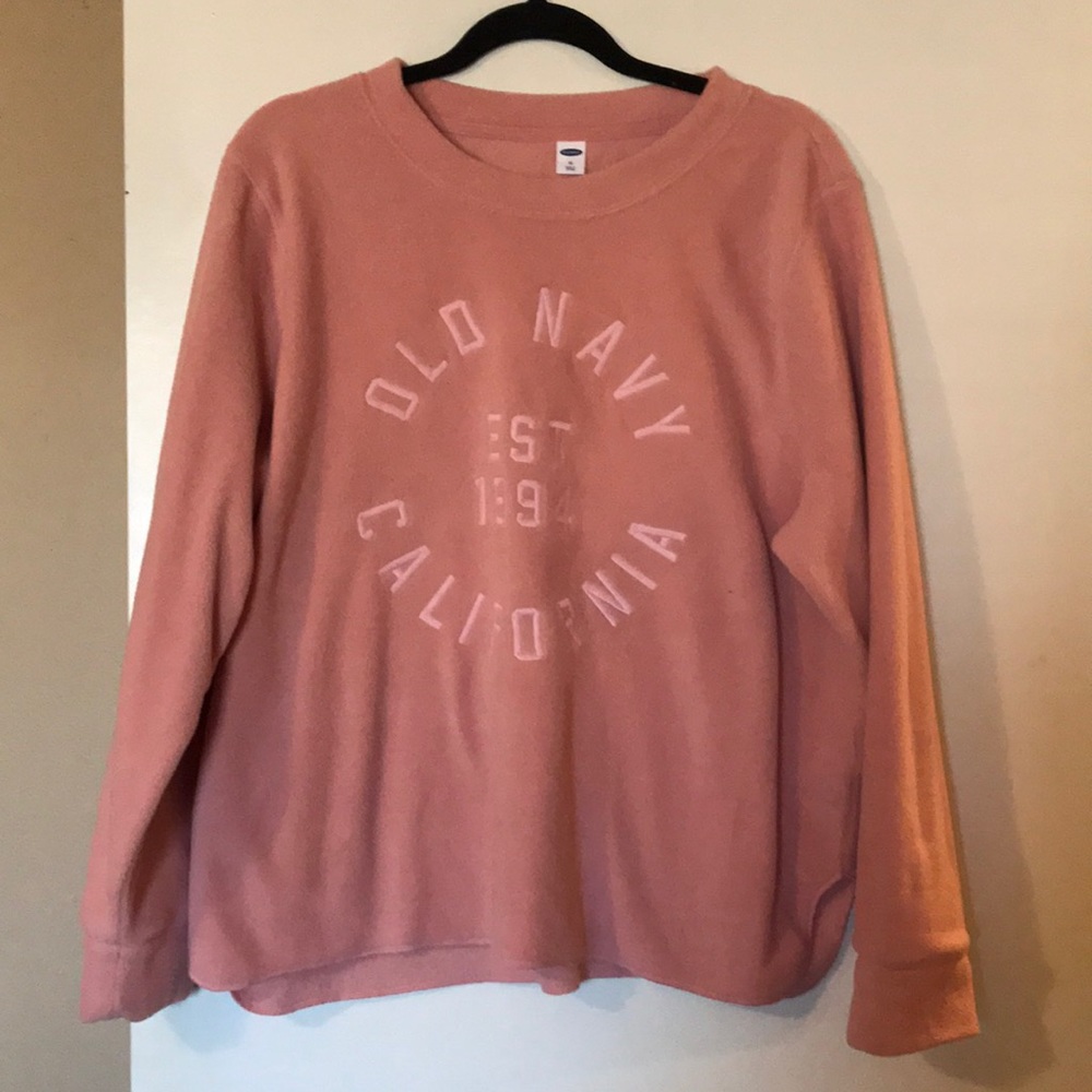 Pink fleece sweatshirt.